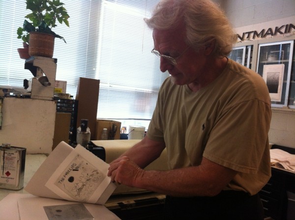 Photo of master printer Scip Barnhart showing the final drypoint print produced by the team of Phillips educators and curators. Photo taken by Brooke Rosenblatt.