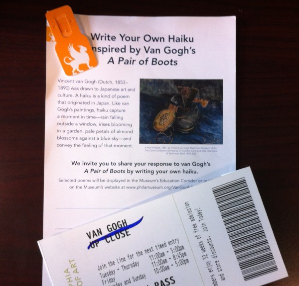My ticket, admission tag (look familiar?) and form asking for a haiku in response to van Gogh’s painting, A Pair of Boots. Photo: Brooke Rosenblatt.