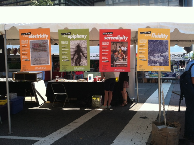 Photo of Phillips summer 2012 promotional banners at the museum's Capital Pride Festival booth
