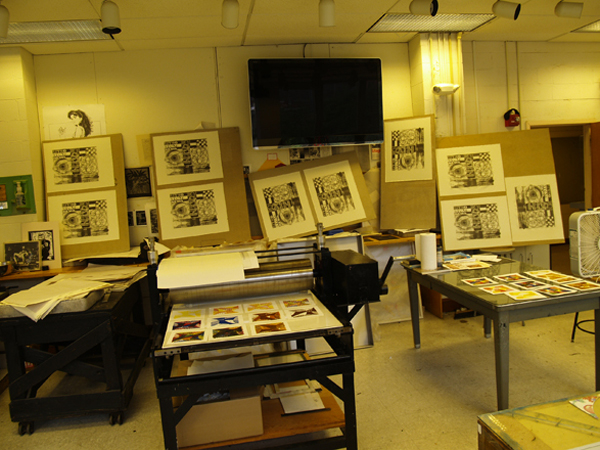 Photo of master printer Scip Barnhart's studio where prints (lithograph) are drying