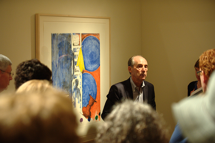Bill Goldston talks to visitors in the galleries