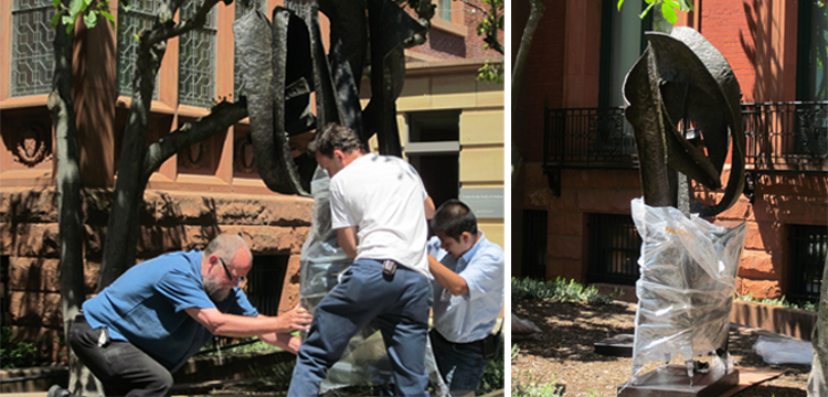 Images of preparators moving the sculpture