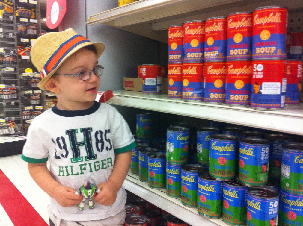 Photo of Brooke Rosenblatt's son shopping for Warhol-inspired Campbell's Soup