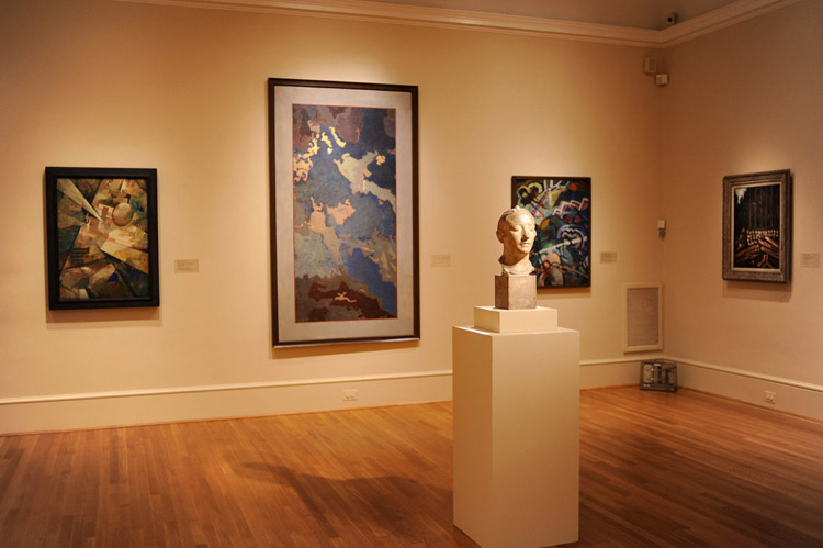 Kurt Schwitters's Radiating World (1920) hangs at left in this view of the current installation of the Phillips Main Gallery. Photo: Joshua Navarro