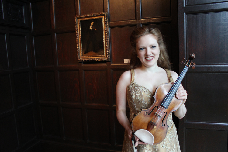 Rachel Barton Pine with her violin in the Music Room