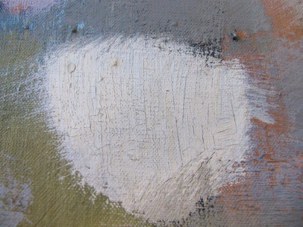 This detail shows an area of cracked and flaking paint. To consolidate the paint, the water-based adhesive was fed into cracks using a small brush.  Adhesive was applied through a layer of tissue to protect the paint surface.  