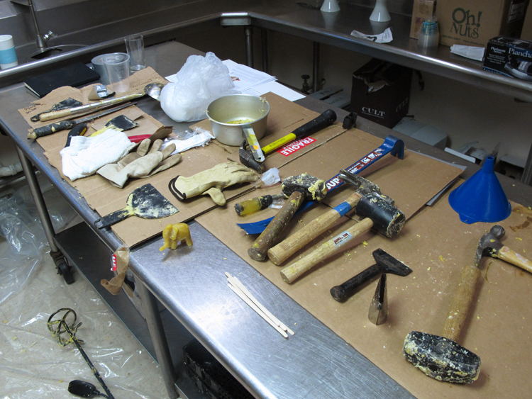 Tools and work space in the museum kitchen during preparation for the wax room