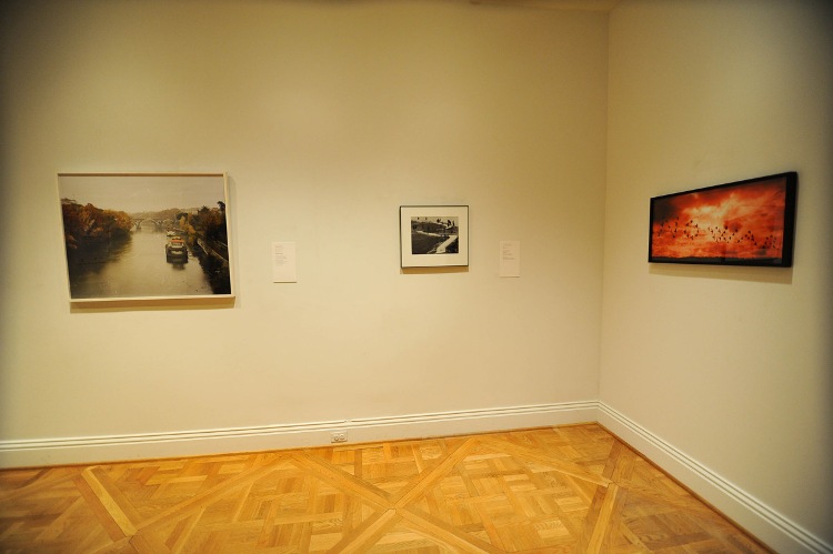 Next Stop Italy installation view by Joshua Navarro. Artworks left to right: Gabriele Basilico's "Ponte Matteotti, Roma" (2007), Gianni Berengo Gardin's "Toscana" (1965), and Renato D'Agostin's "Paris" (2005).