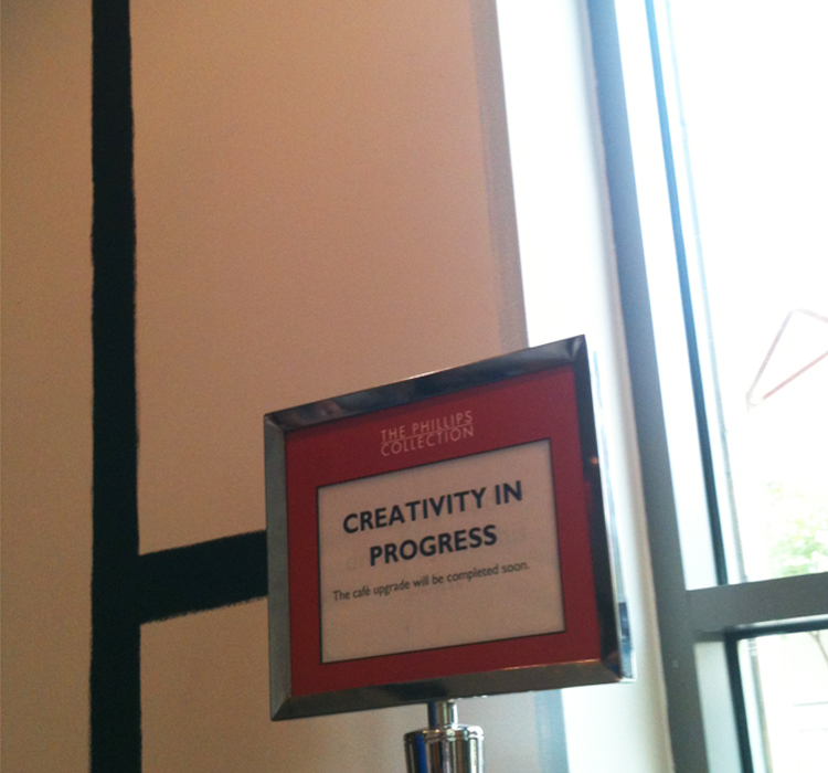 Image of sign reading Creativity in Progress