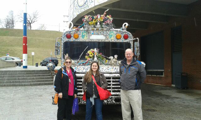 Cherie Nichols, director of budgeting and reporting, Lydia O'Connor, finance assistant, and Earl Richards, senior accountant with the art bus at the American Visionary Art Museum.
