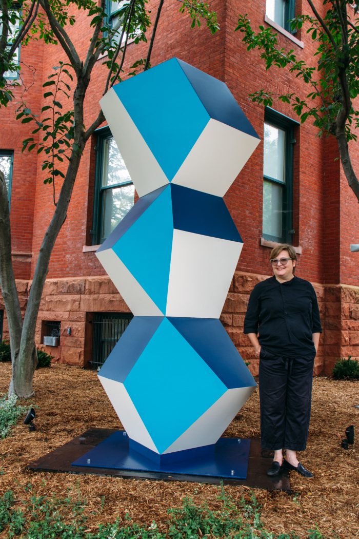 Angela Bulloch with her sculpture. Heavy Metal Stack: Fat Cyan Three, 2018, Powder coated steel, Made possible with support from Susan and Dixon Butler, Nancy and Charles Clarvit, John and Gina Despres, A. Fenner Milton, Eric Richter, Harvey M. Ross, George Vradenburg and The Vradenburg Foundation