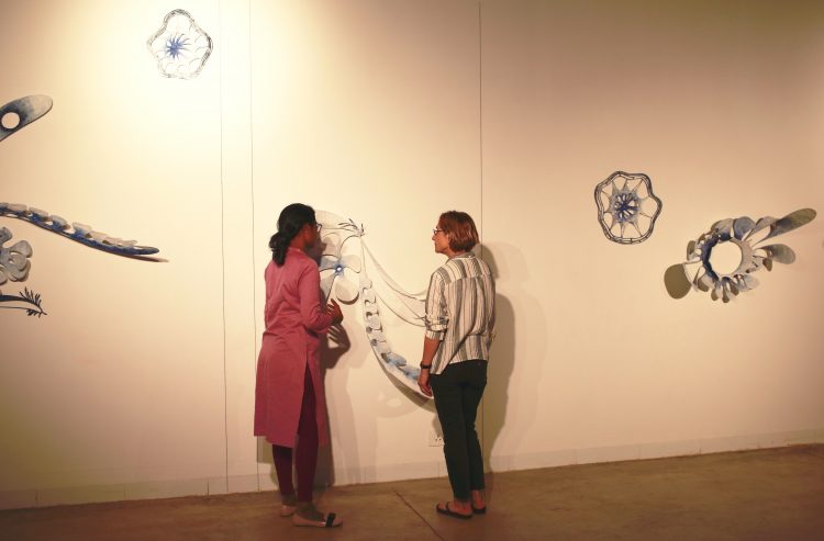 Ranjani Shettar and Vesela Sretenović discuss an installation in progress.